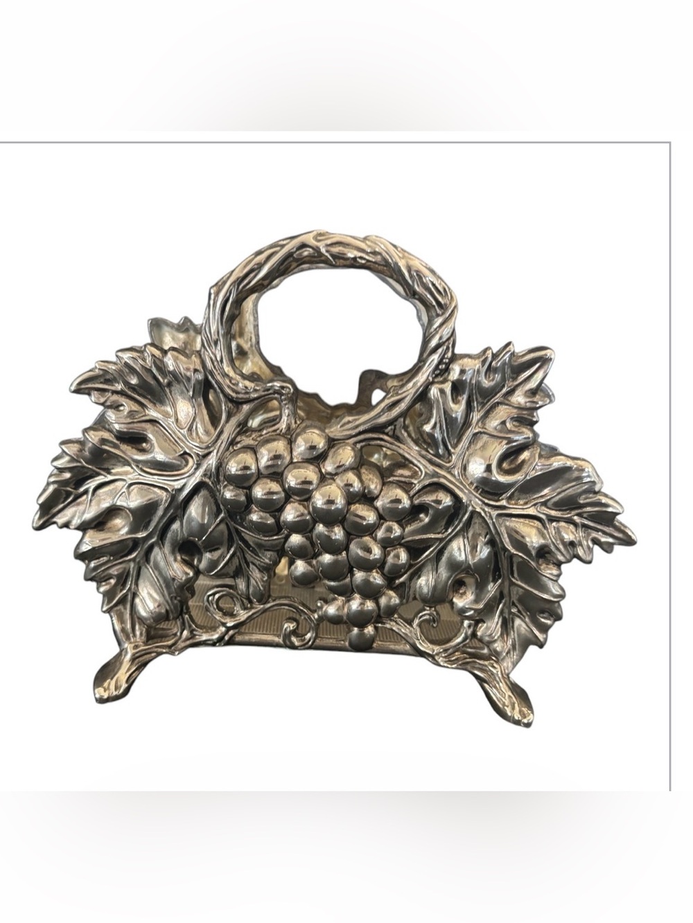 vintage 1994 Godinger silver-plated napkin holder features an embossed